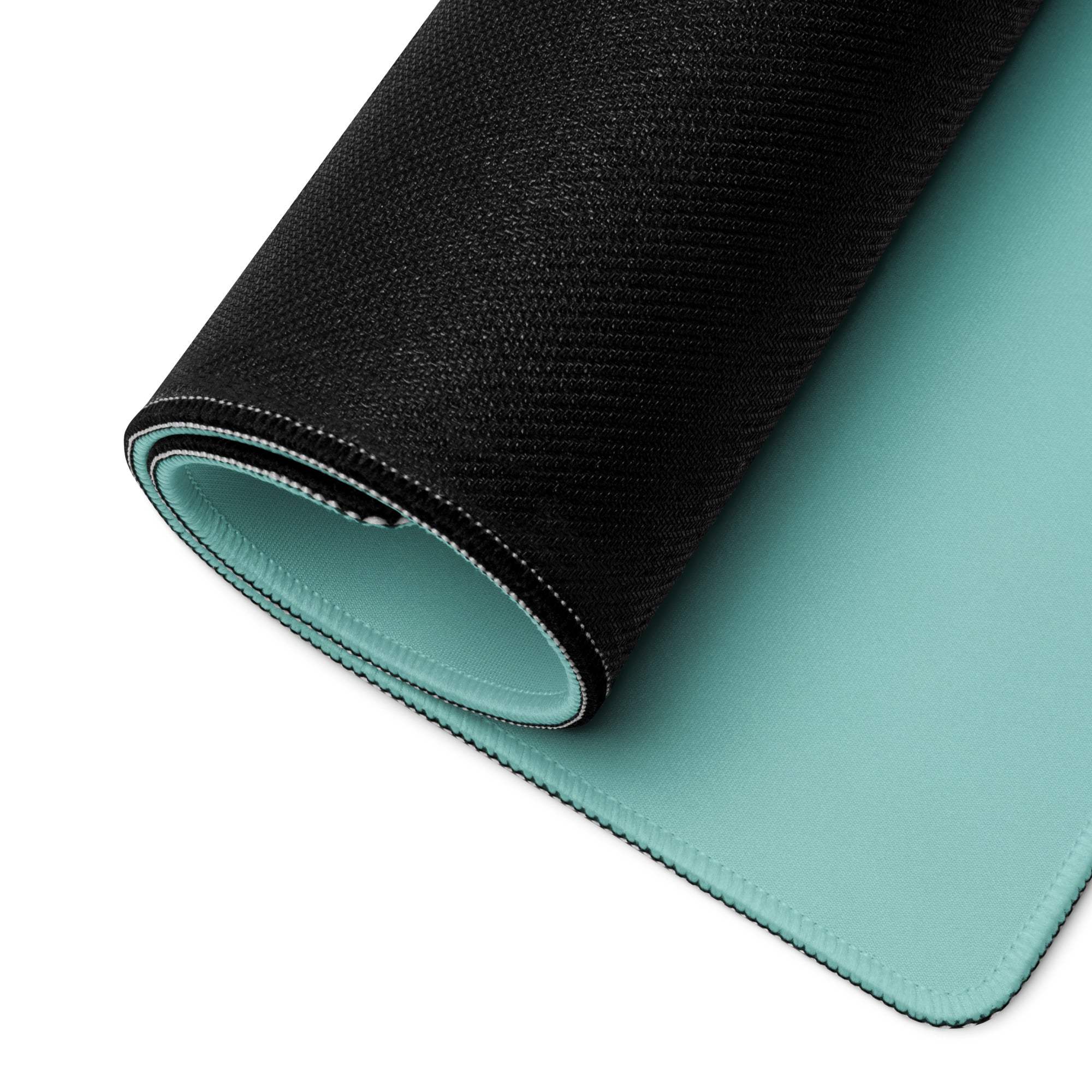 Black and teal two-sided large gaming mousepad with textured back, edge stitching