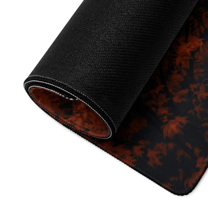 Backside of Autumn Orange Cityscape gaming mouse pad with black textured non-slip base and red black leaf pattern