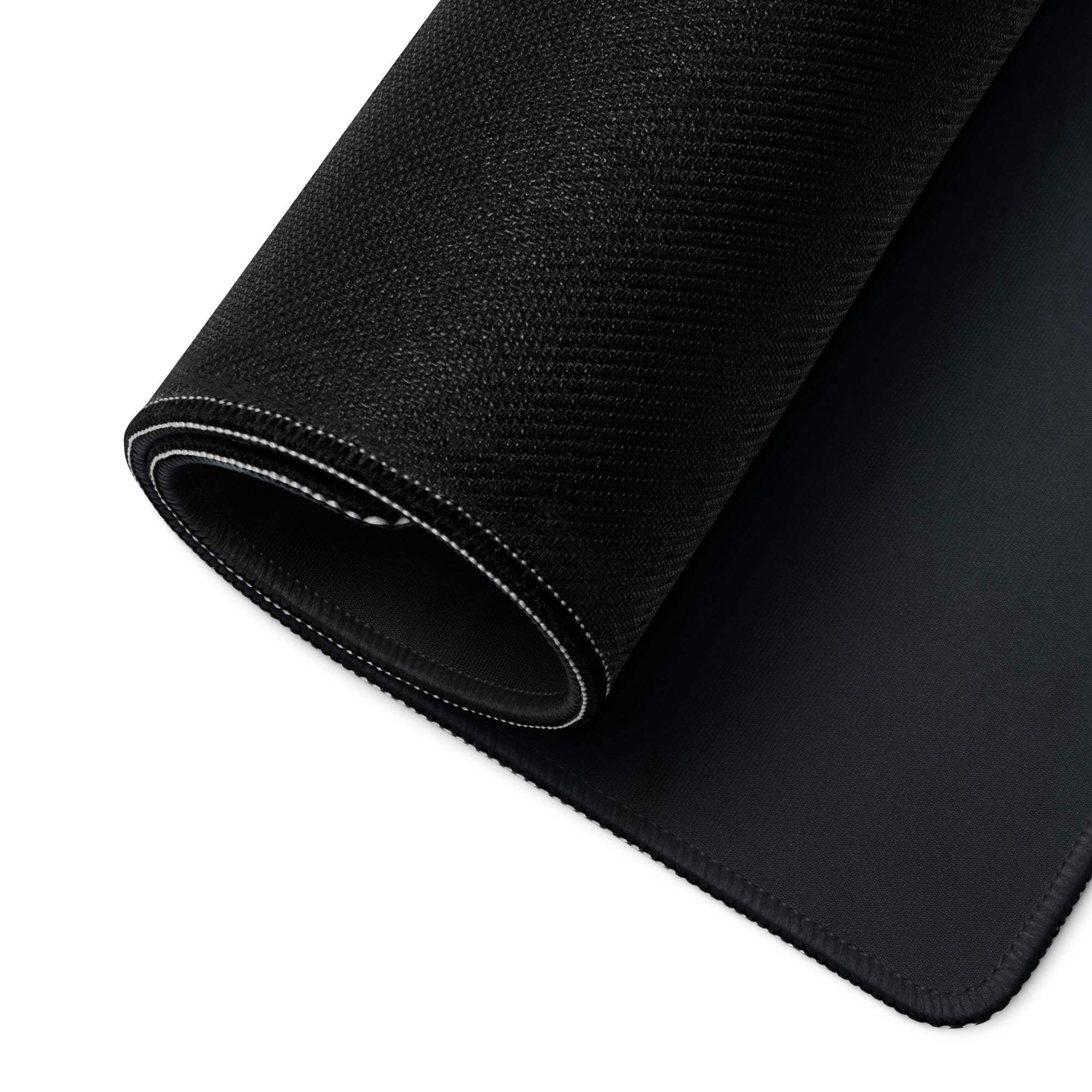 Black textured gaming mousepad with stitched edges, non-slip base, large surface