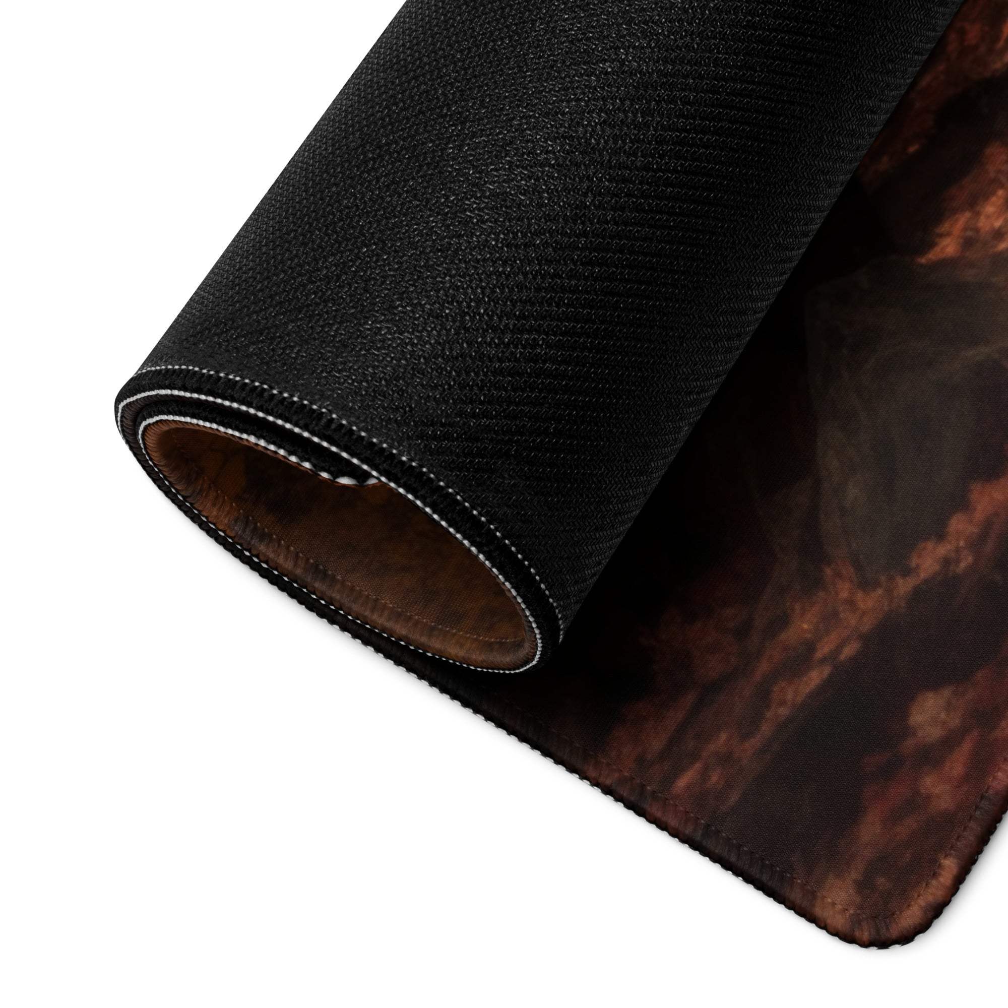 Black textured gaming mousepad with autumn forest sunset design and stitched edge