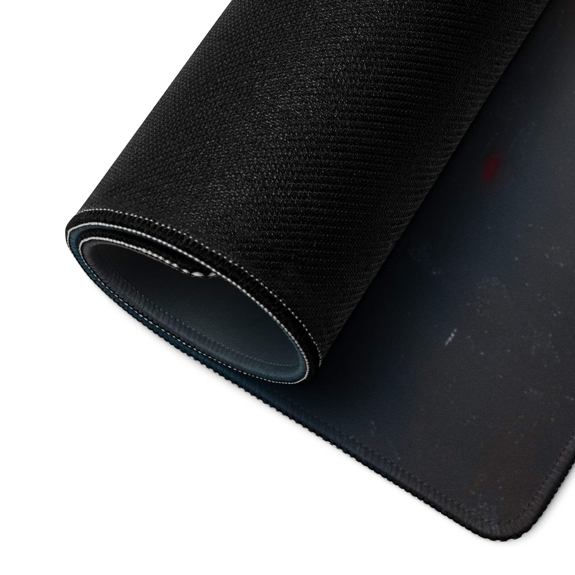 Black textured gaming mousepad with stitched edges, red accent, non-slip base