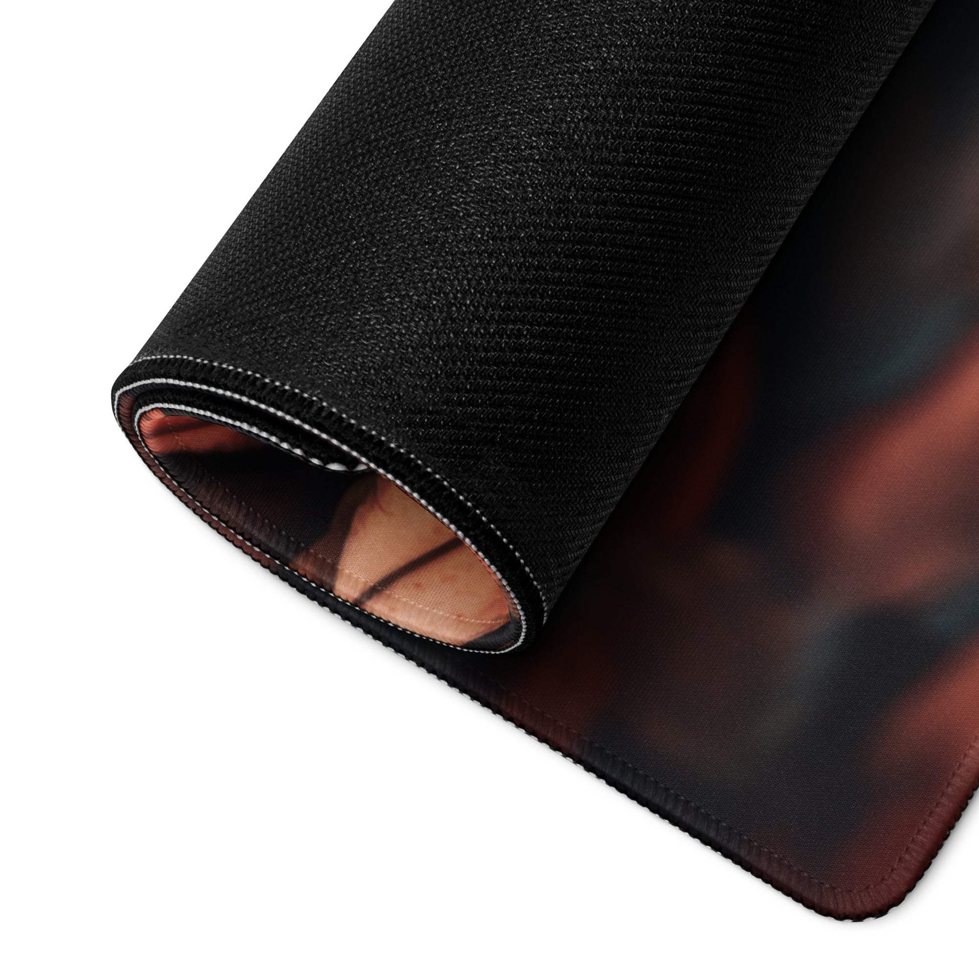 Autumn Leaves large gaming mouse pad with black textured surface, rolled edge, red-orange gradient, non-slip base, durable stitching