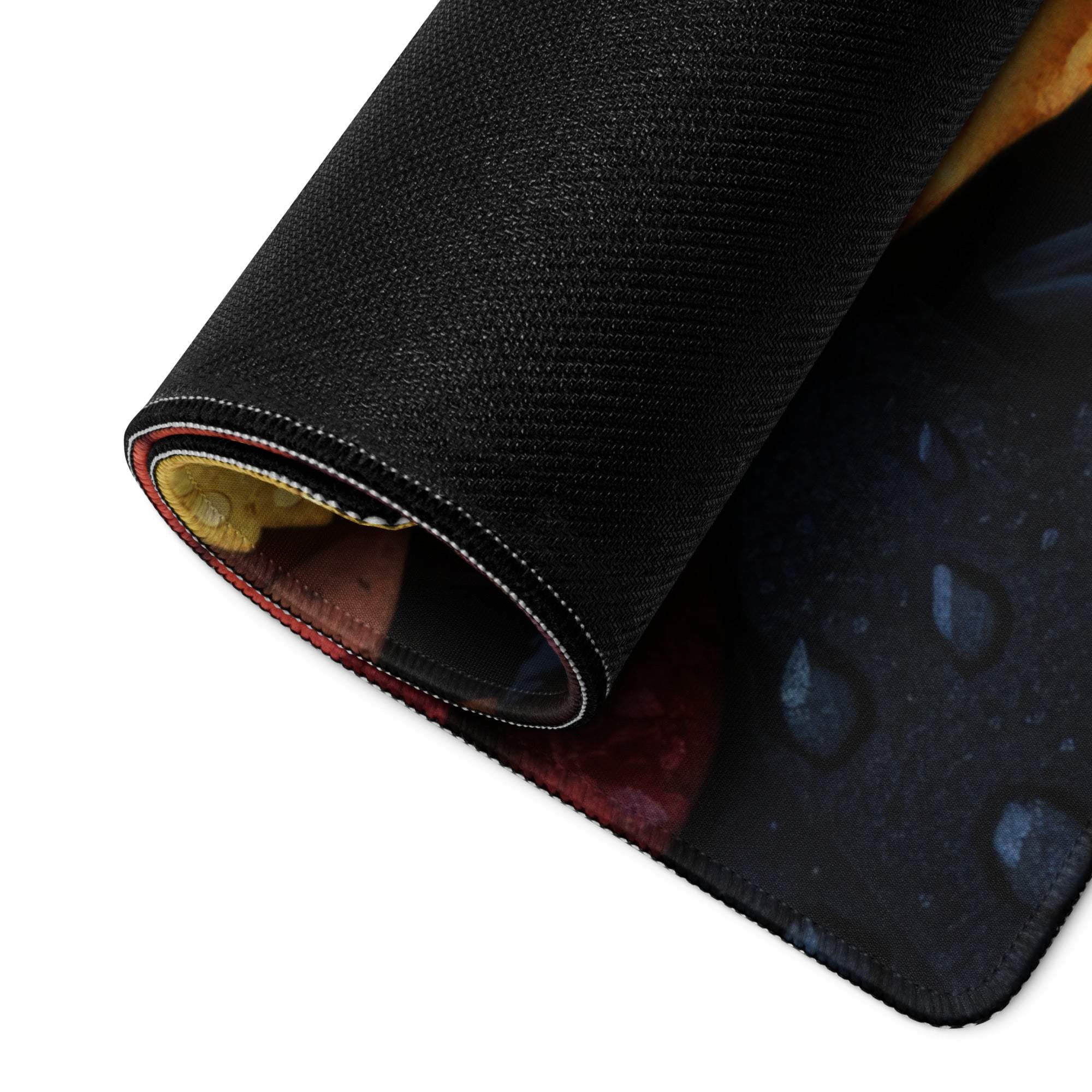 Black textured space-themed mousepad, vibrant autumn leaves design