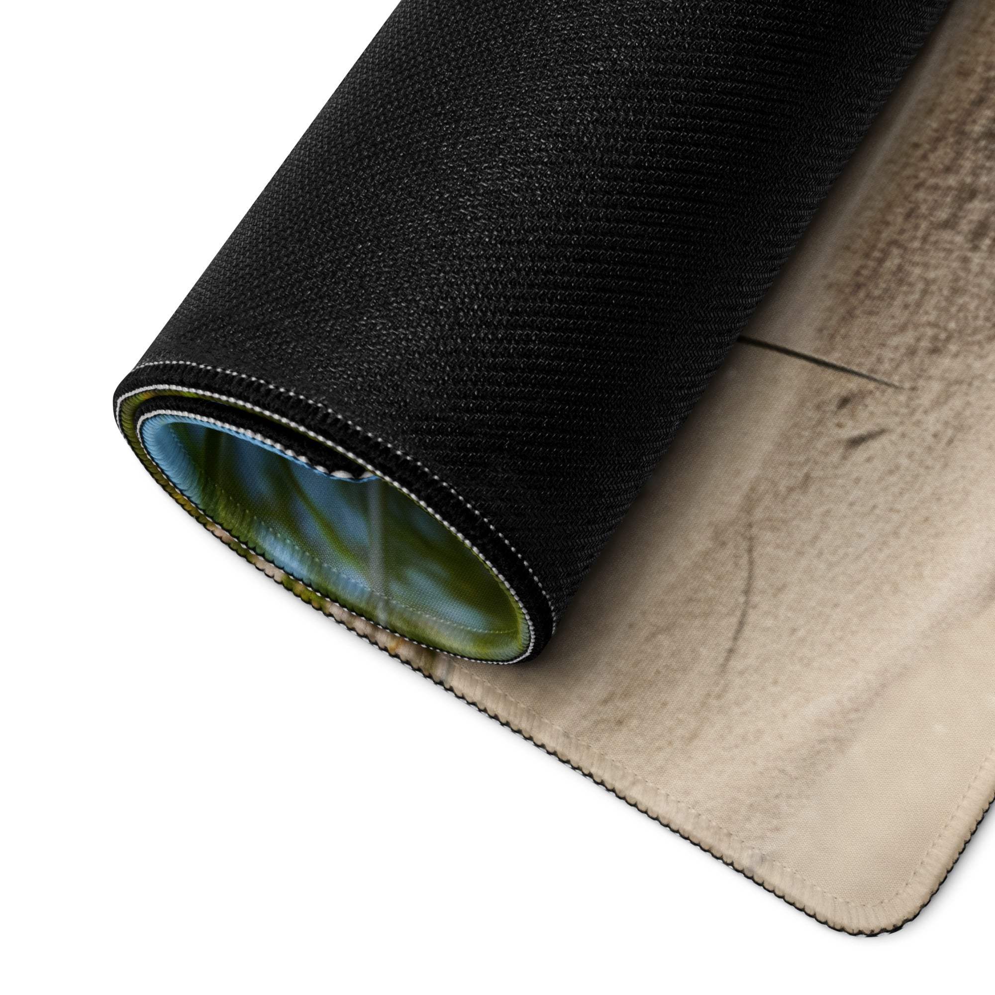 Black textured large gaming mouse pad back with rolled edge stitching