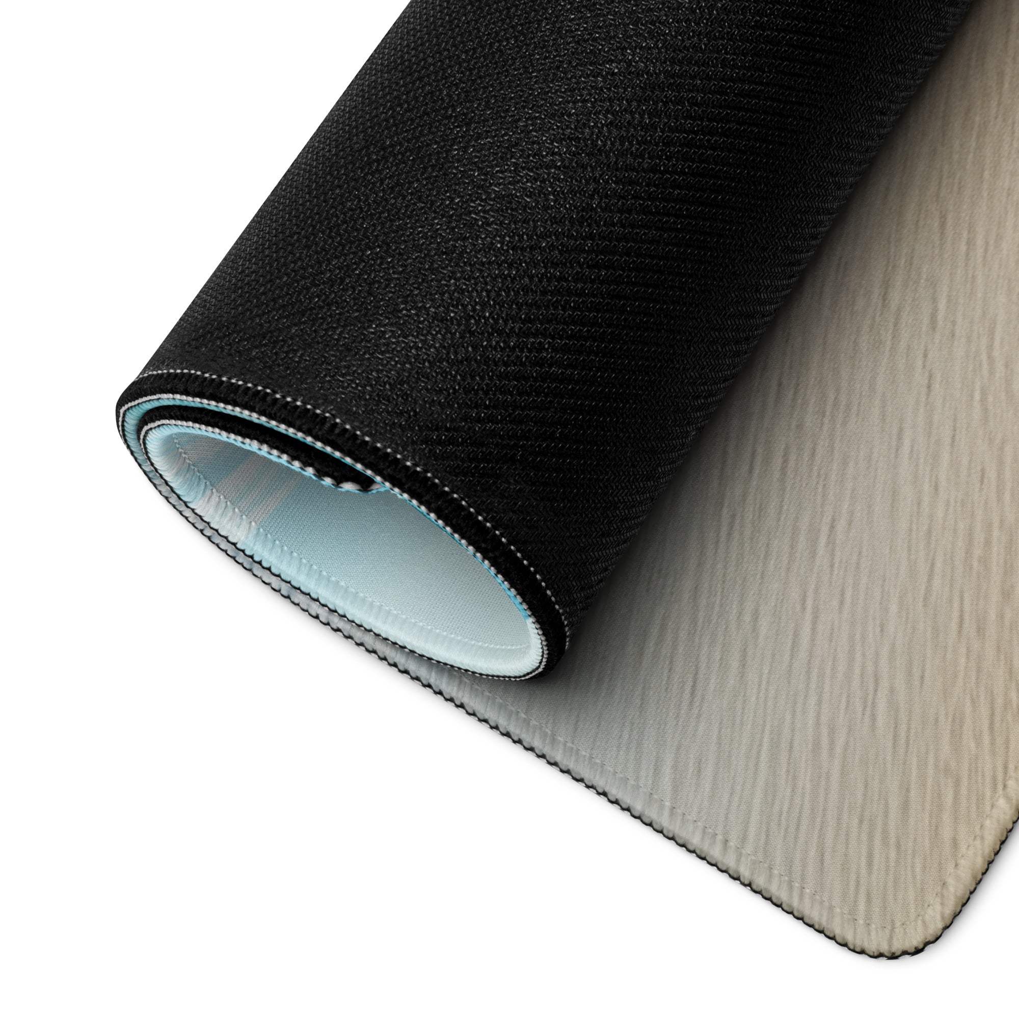 Calm Ocean Blue gaming mouse pad back: black textured top, light blue lining, beige underside