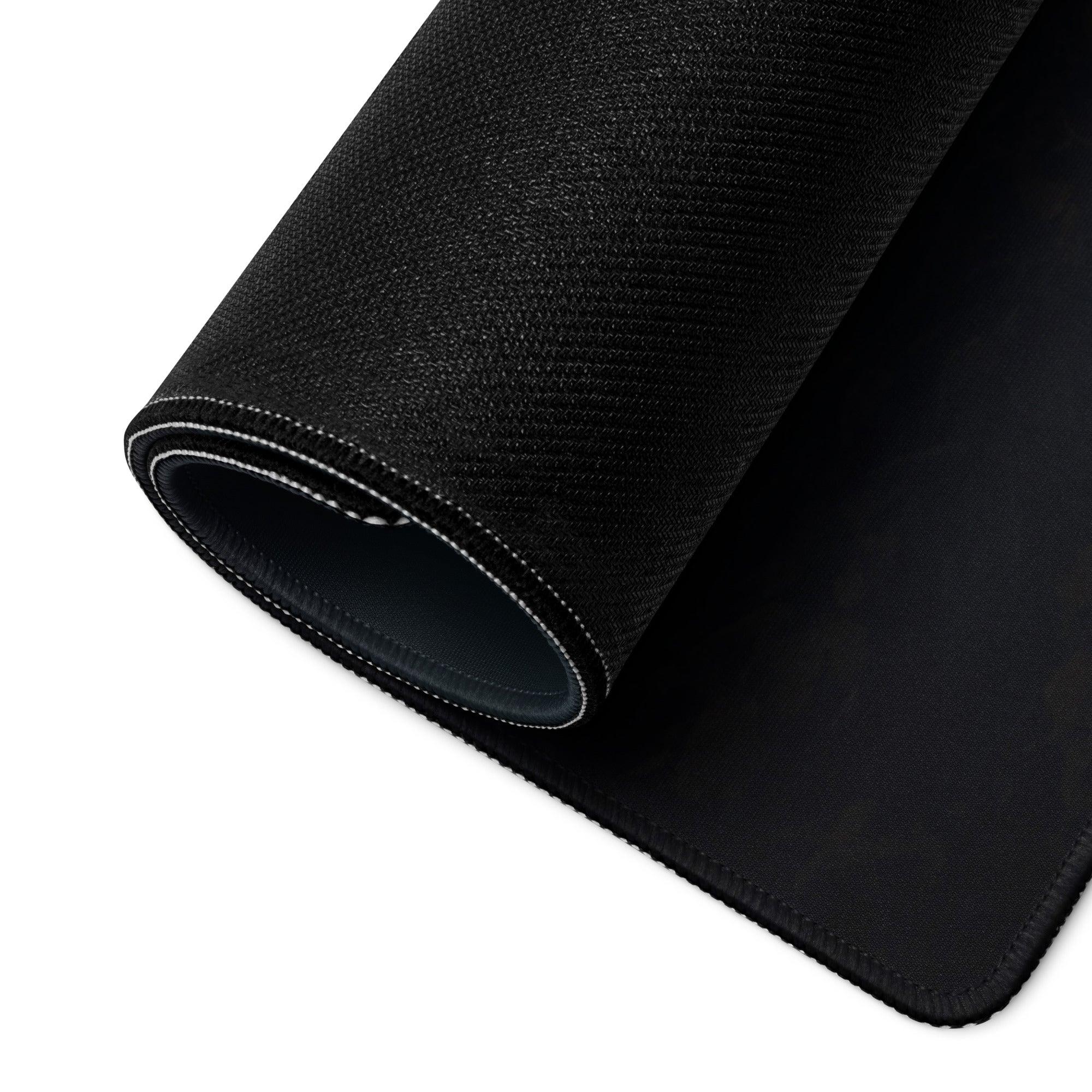 Black stitched-edge mousepad back with white seam, Halloween pumpkin design