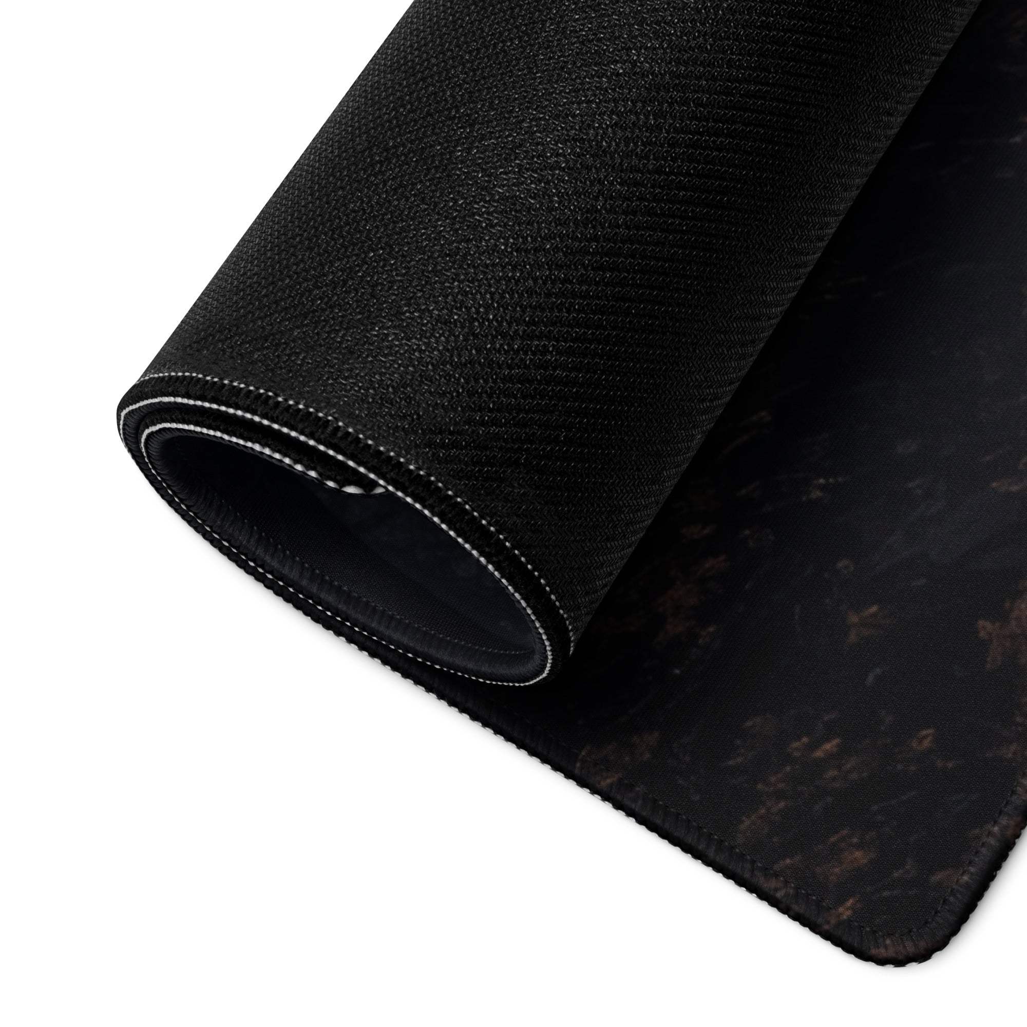 Black textured marbled gaming mouse pad with white edge stitching