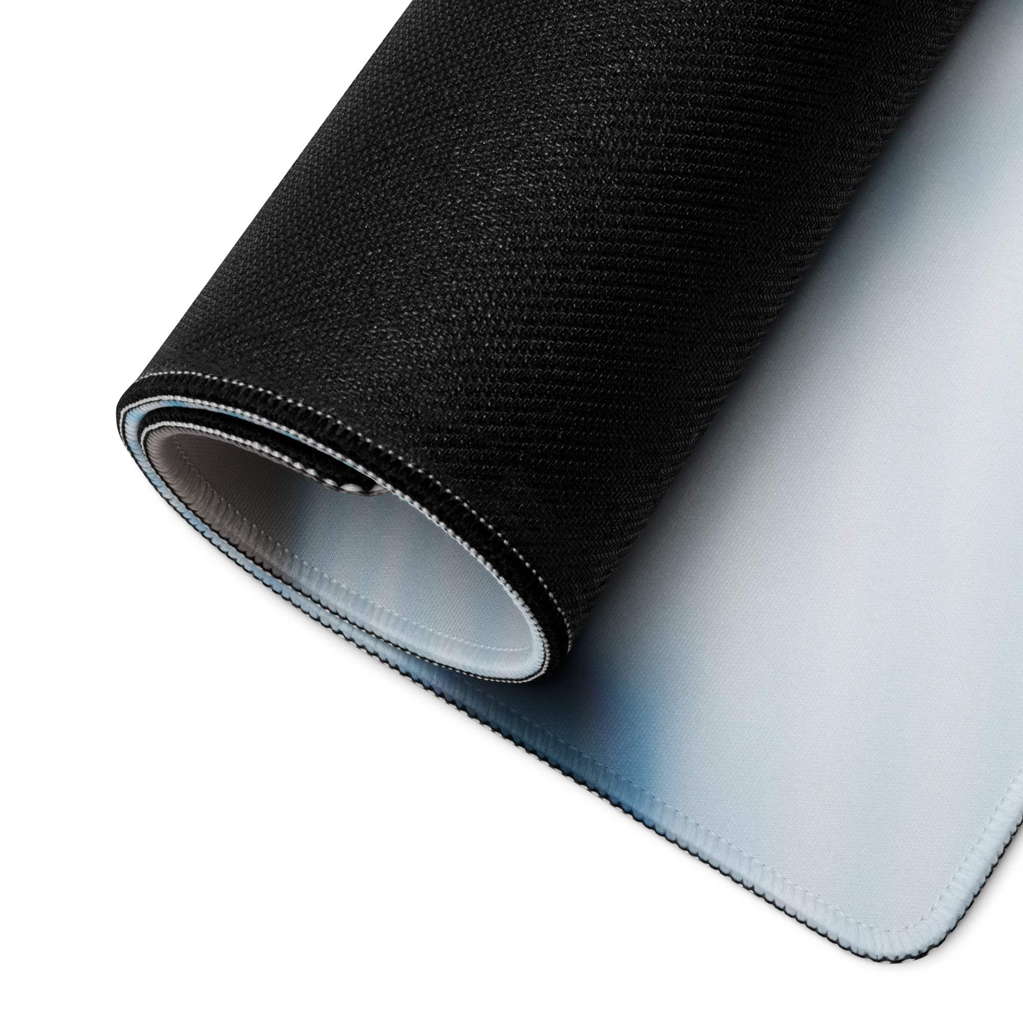 Back of black textured premium gaming mousepad with white underside and stitched edges