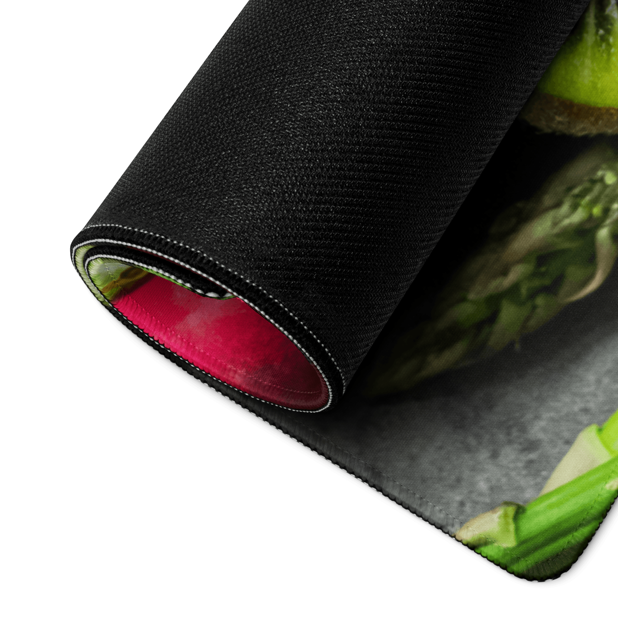 Black textured mousepad with green asparagus, red lining, vibrant fruit theme