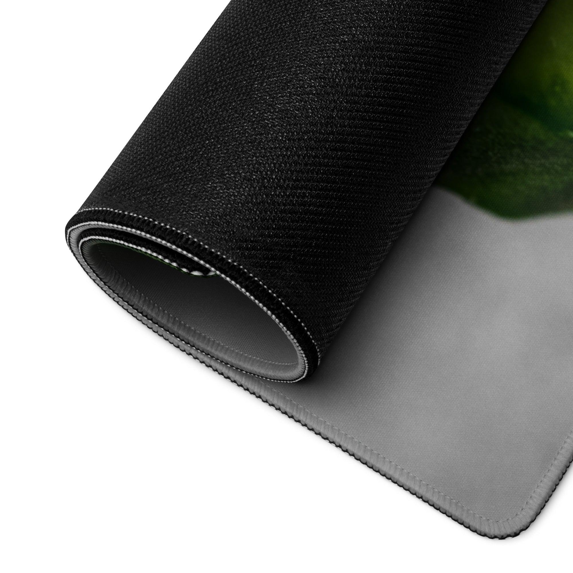Back of black textured Fresh Green Cucumbers gaming mousepad with gray underside and stitched edges