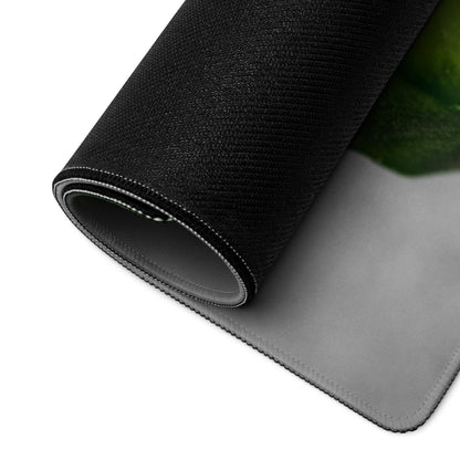 Back of black textured Fresh Green Cucumbers gaming mousepad with gray underside and stitched edges