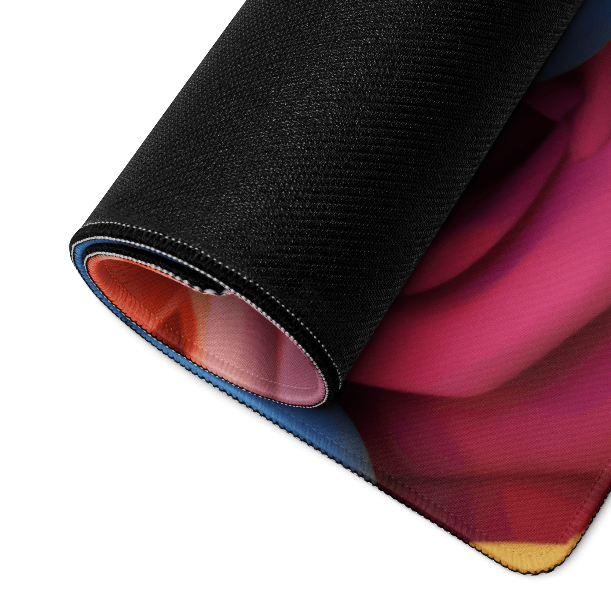 Vibrant floral rainbow gaming mouse pad with black textured gradient interior
