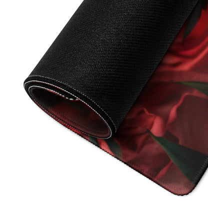 Black textured gaming mousepad with vibrant red rose design and stitched edges