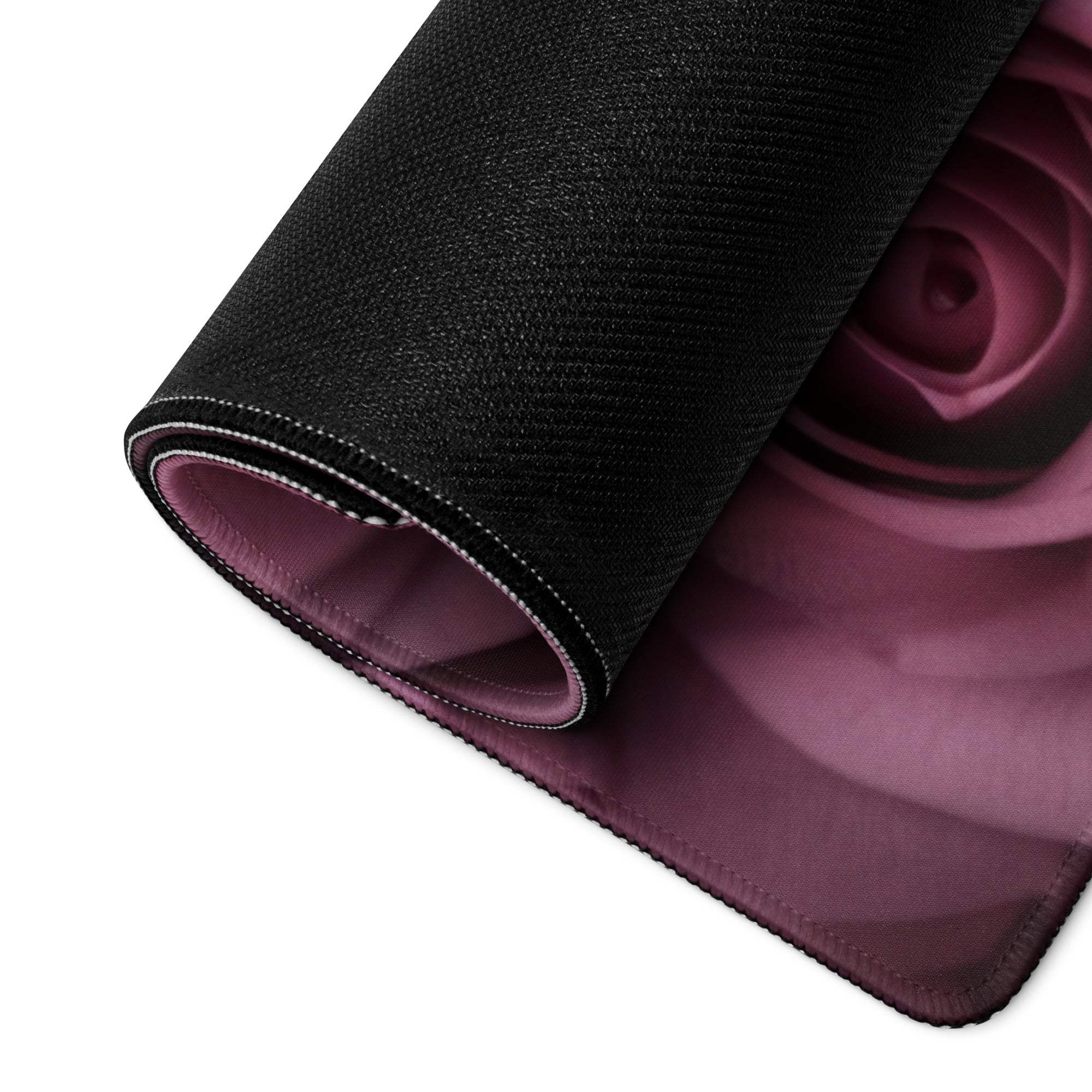 Black textured gaming mousepad with purple rose design and non-slip base