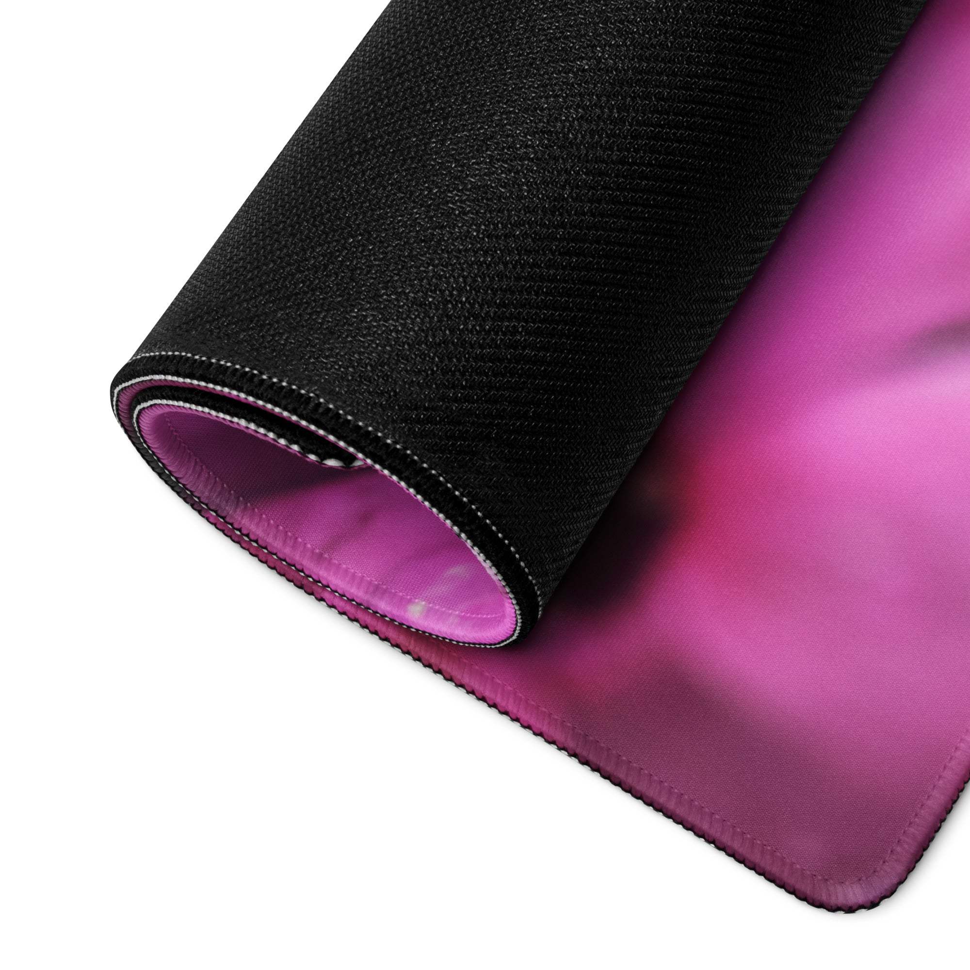 Floral pink bloom gaming mouse pad with black textured outer surface