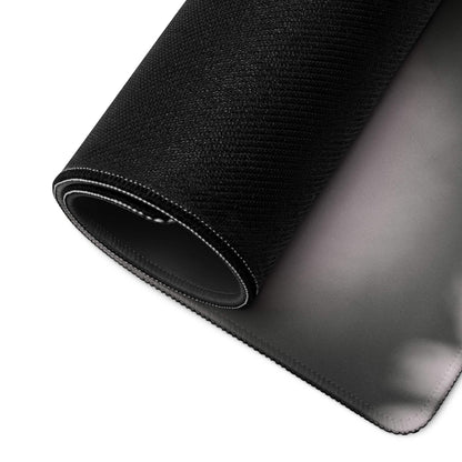 Black textured gaming mousepad with smooth reflective surface and stitched edges