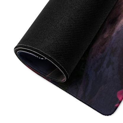 Black textured gaming mousepad with pink floral design, rolled edge, non-slip base