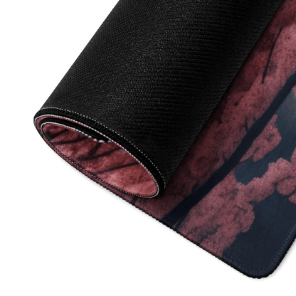 Black textured gaming mousepad back with red cherry blossom, pink mountain design, white stitching