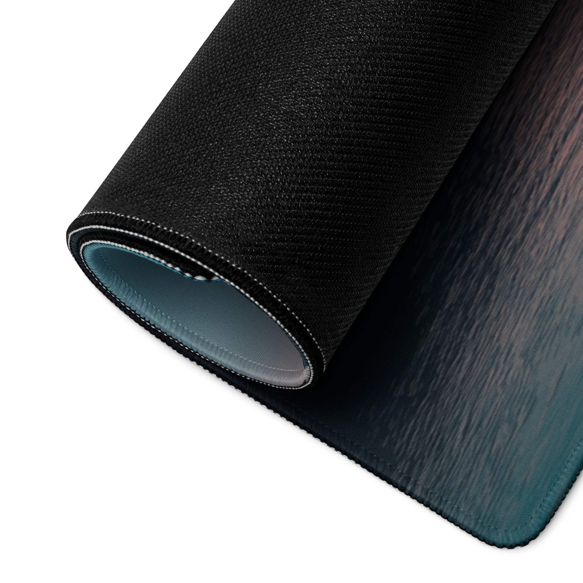 Black textured mousepad with wood grain gradient and teal lining