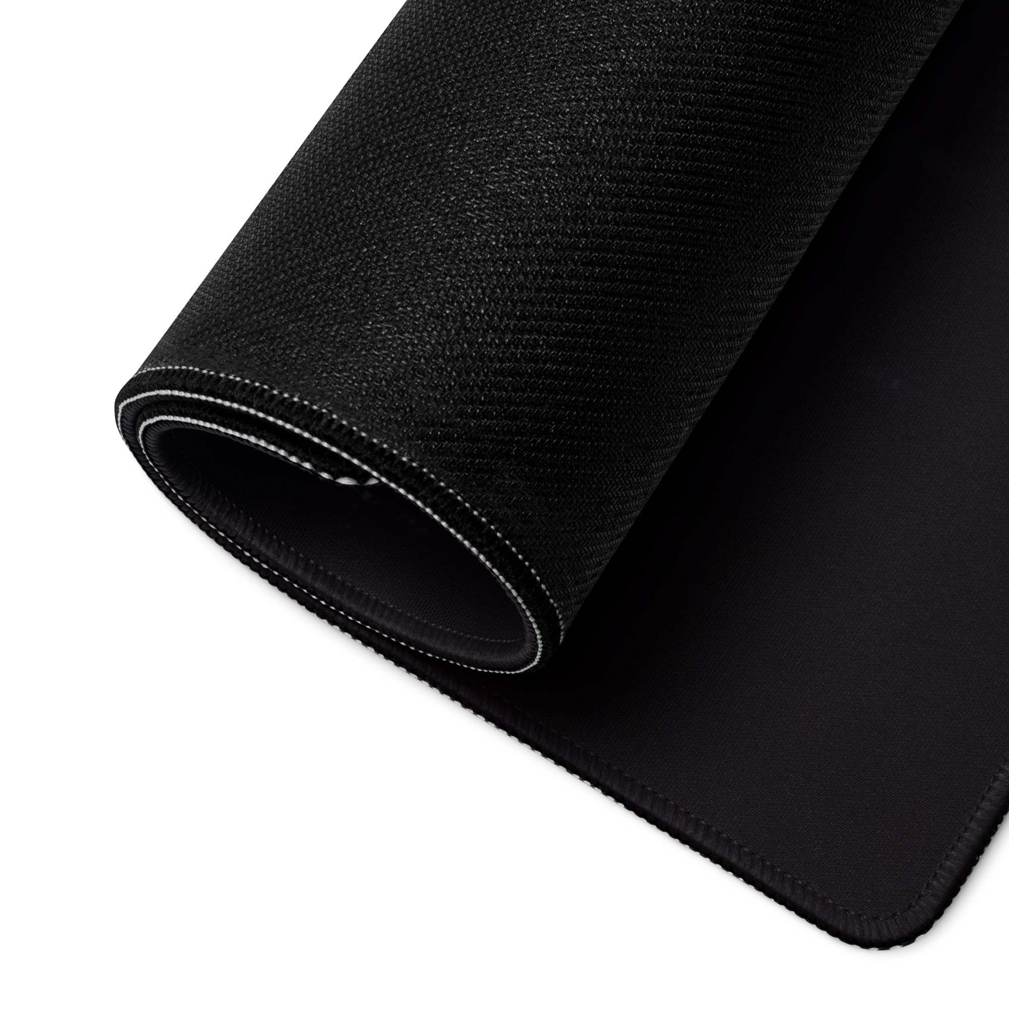 Large black textured non-slip gaming mousepad with white edge stitching