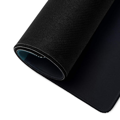Black textured gaming mousepad with stitched edges, teal lining, non-slip base