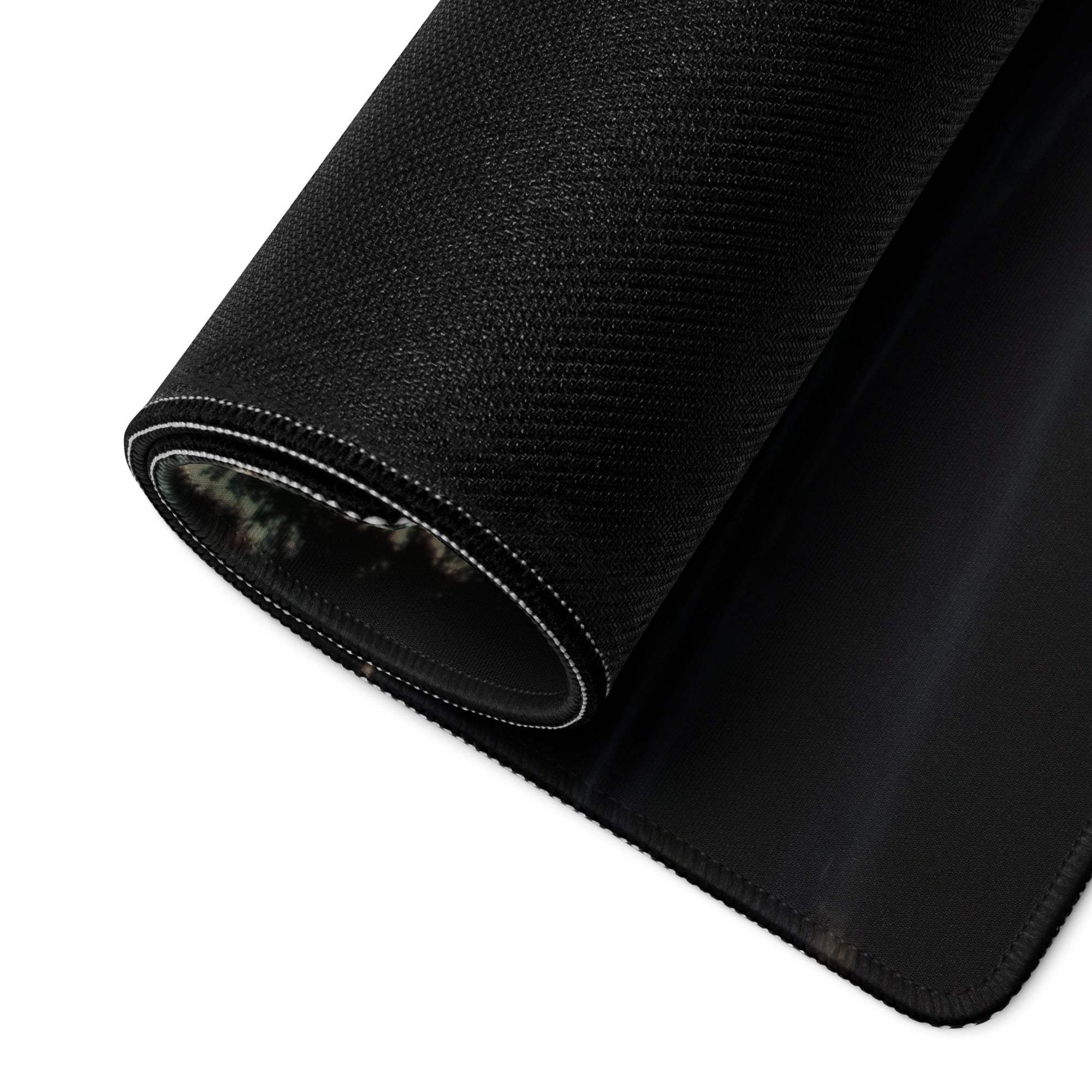 Black textured woven mousepad with reinforced edges and non-slip base