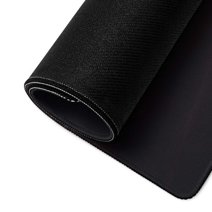 Black textured oversized gaming mousepad with stitched edges, neon blue glow