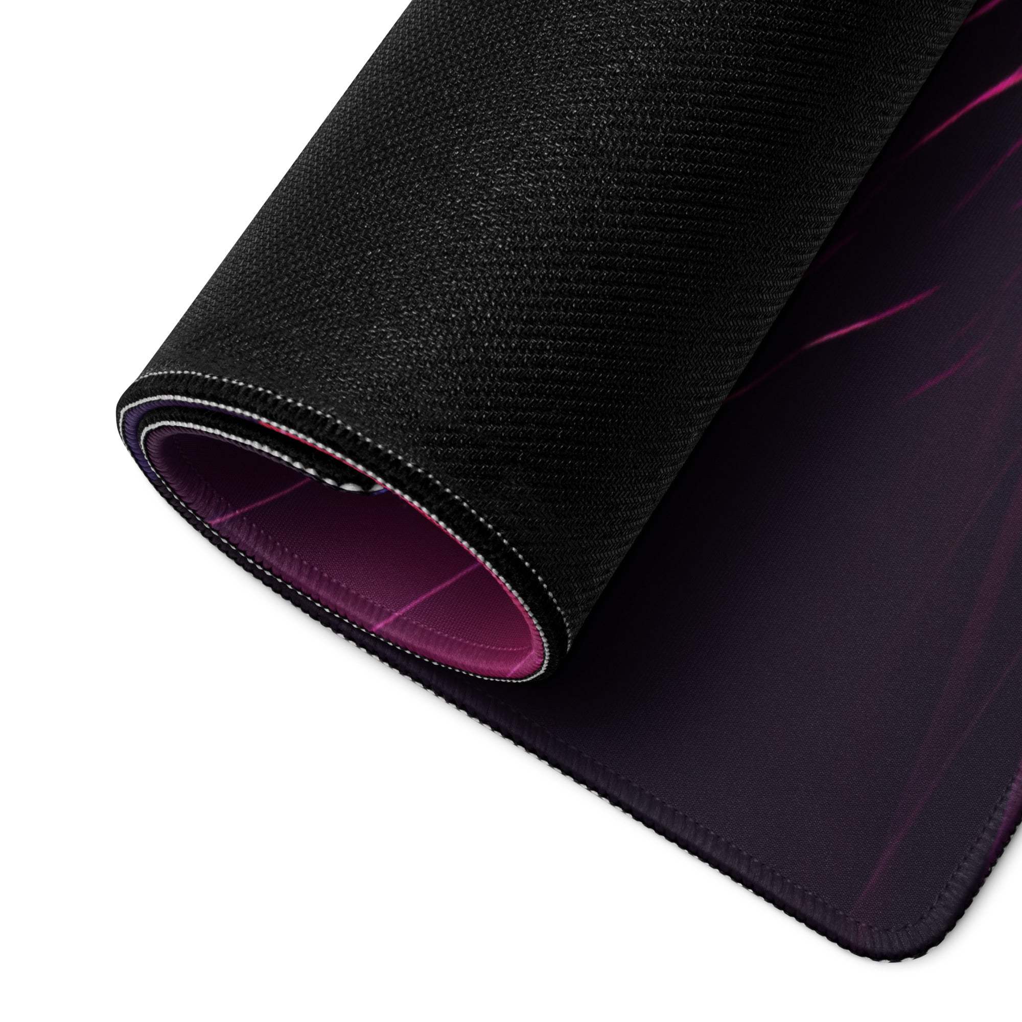 Black gaming mousepad with purple accents, textured surface, non-slip base