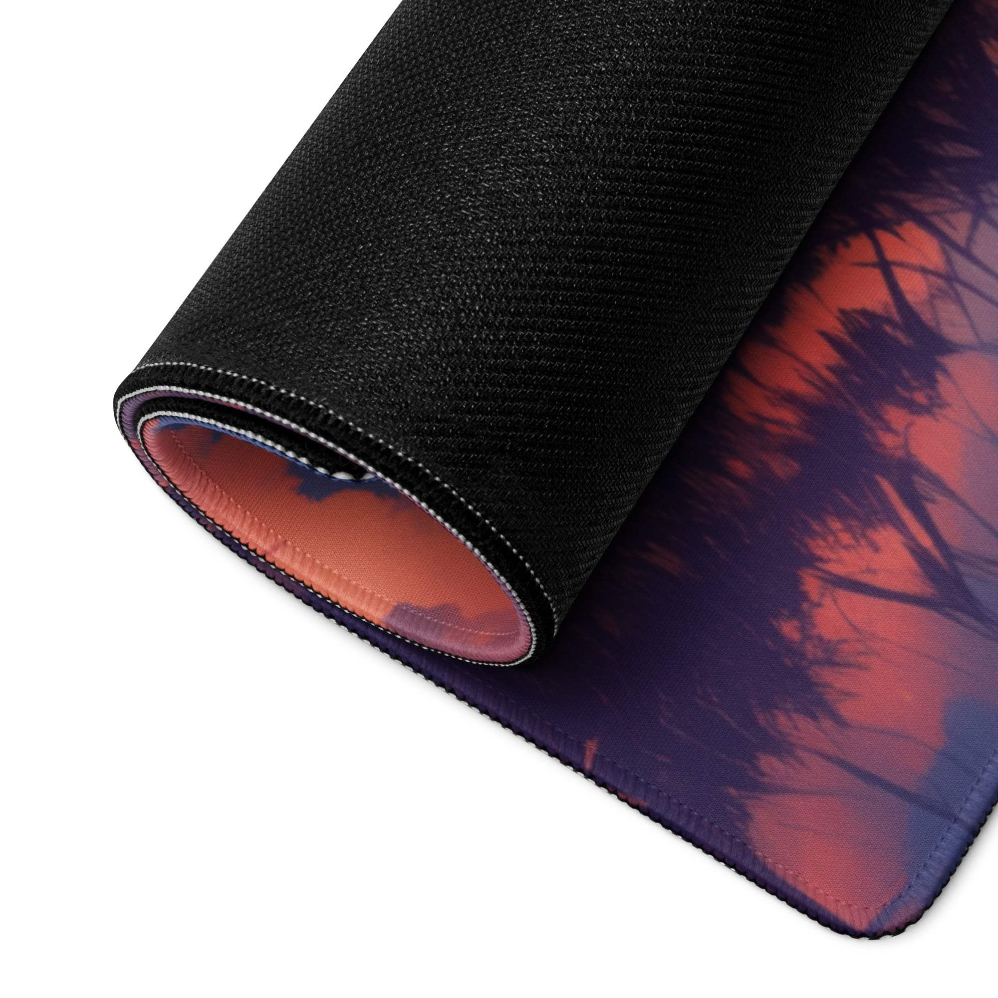 Rolled-up black Sunset Tree Landscape gaming mouse pad with red purple sunset forest design