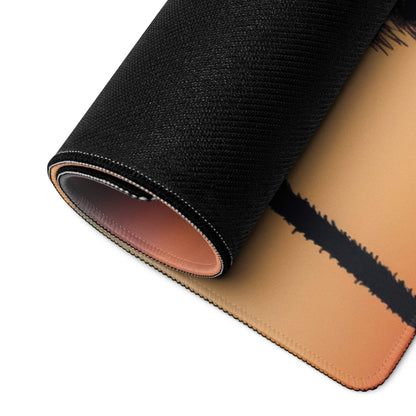 Black and tan textured gaming mousepad rolled to show stitched edges