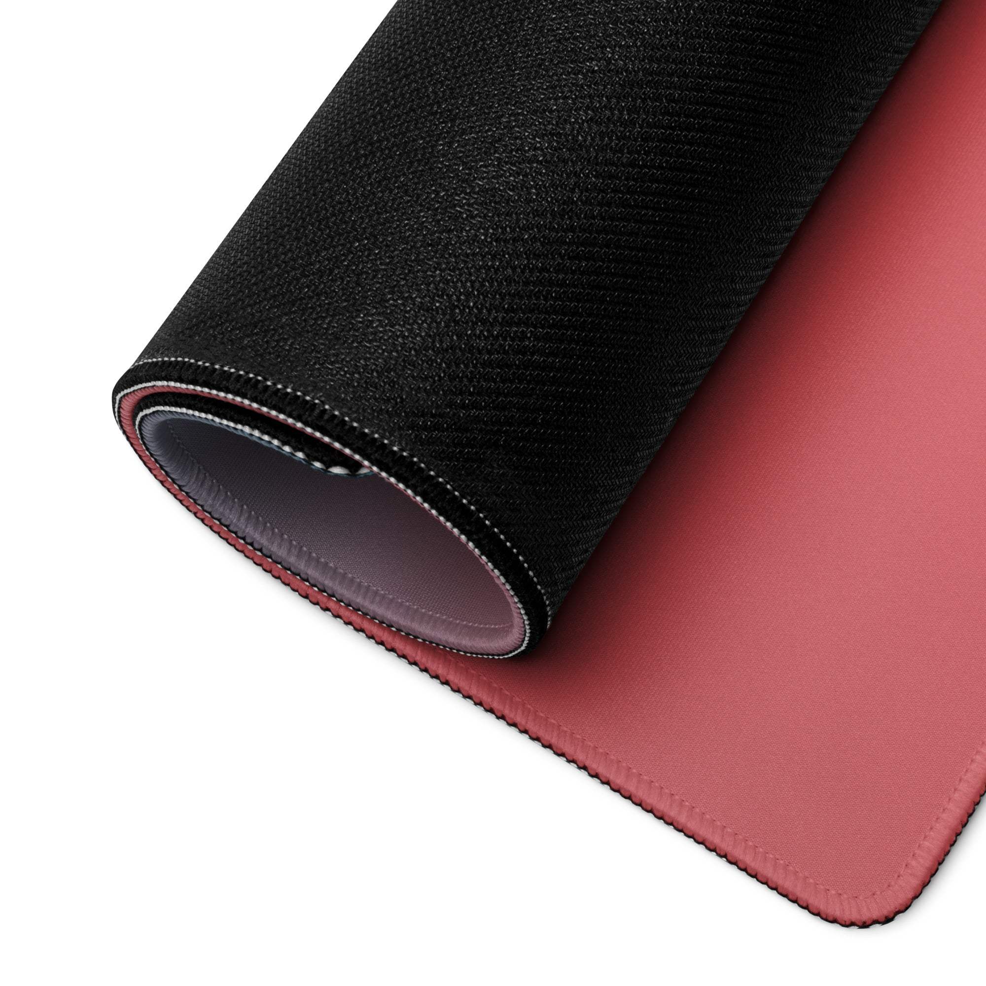 Black and rose gaming mousepad with textured surface, stitched edges