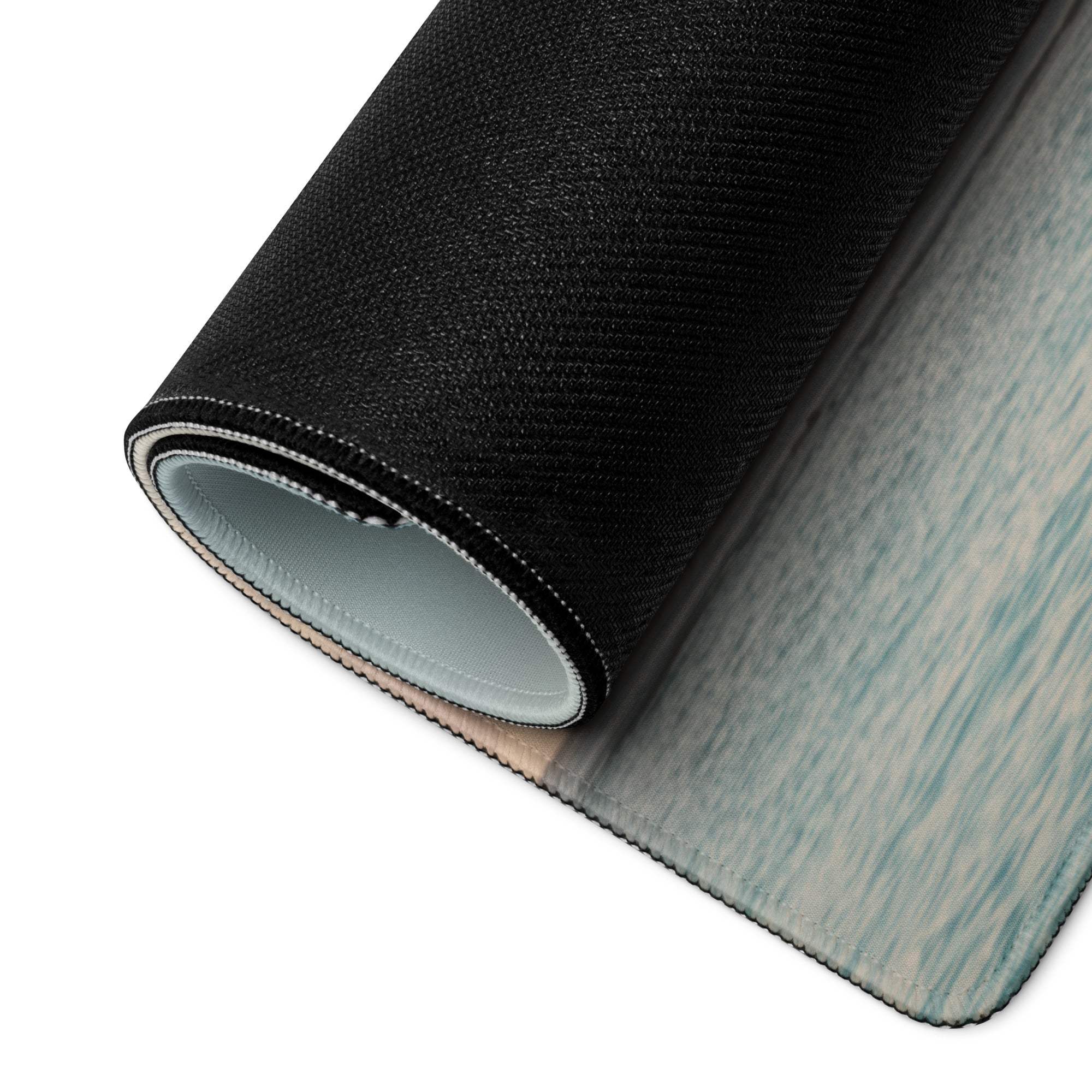Black textured ocean gradient gaming mouse pad with gray lining