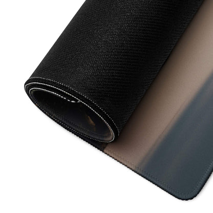Black textured fabric roll with white edge stitching on gaming mouse pad back