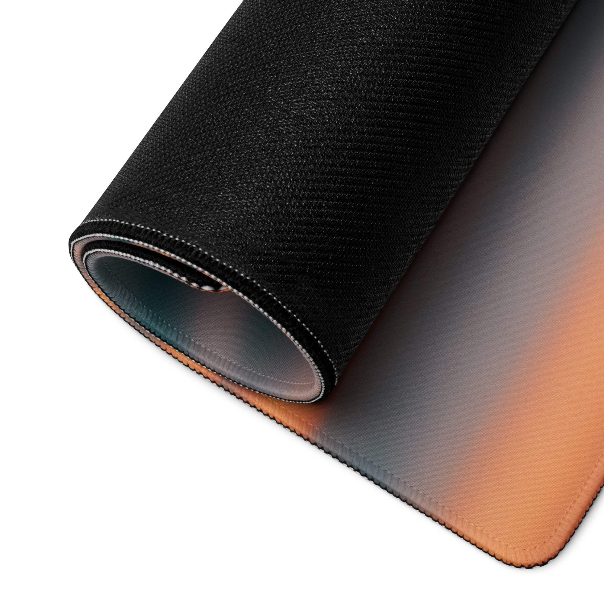 Premium Ocean Sunset large gaming mouse pad with black textured gradient orange-to-gray surface and stitched edges
