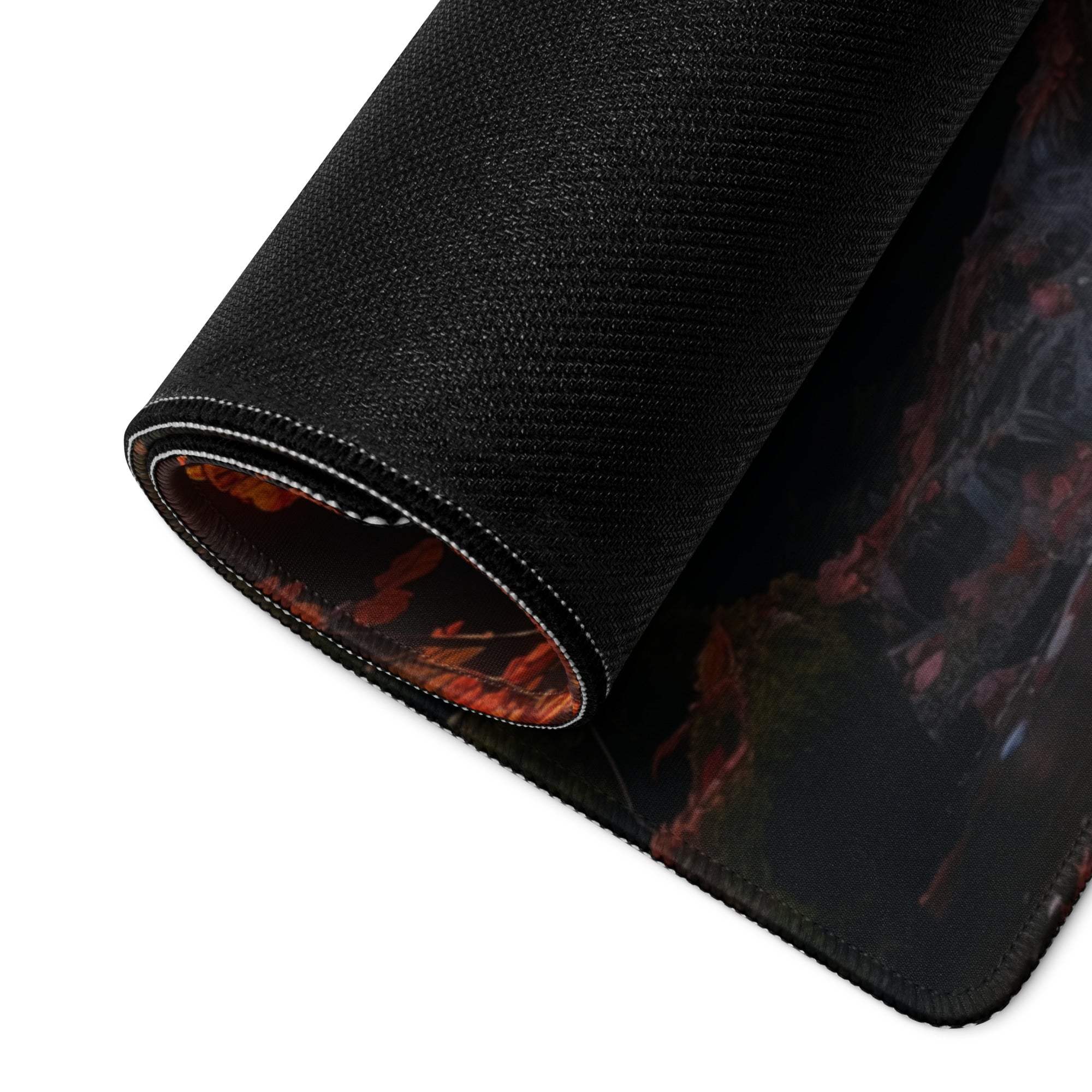 Black gaming mousepad back with fiery red-orange design, stitched edge, non-slip base