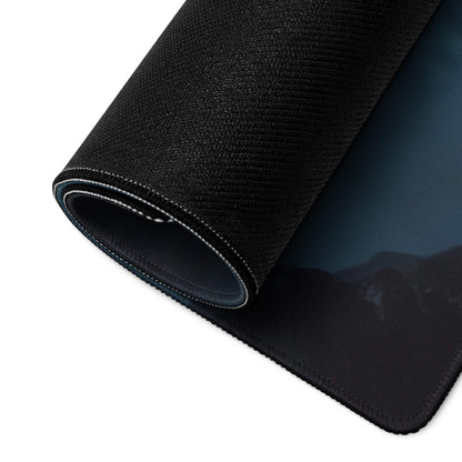Black textured gaming mousepad with moody blue waterfall mountains, non-slip base