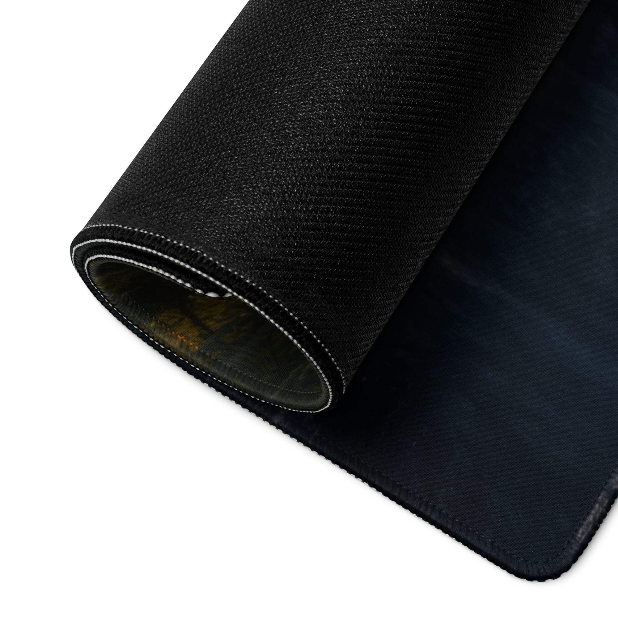 Black textured gaming mousepad with rolled edge, stitched border, non-slip backing