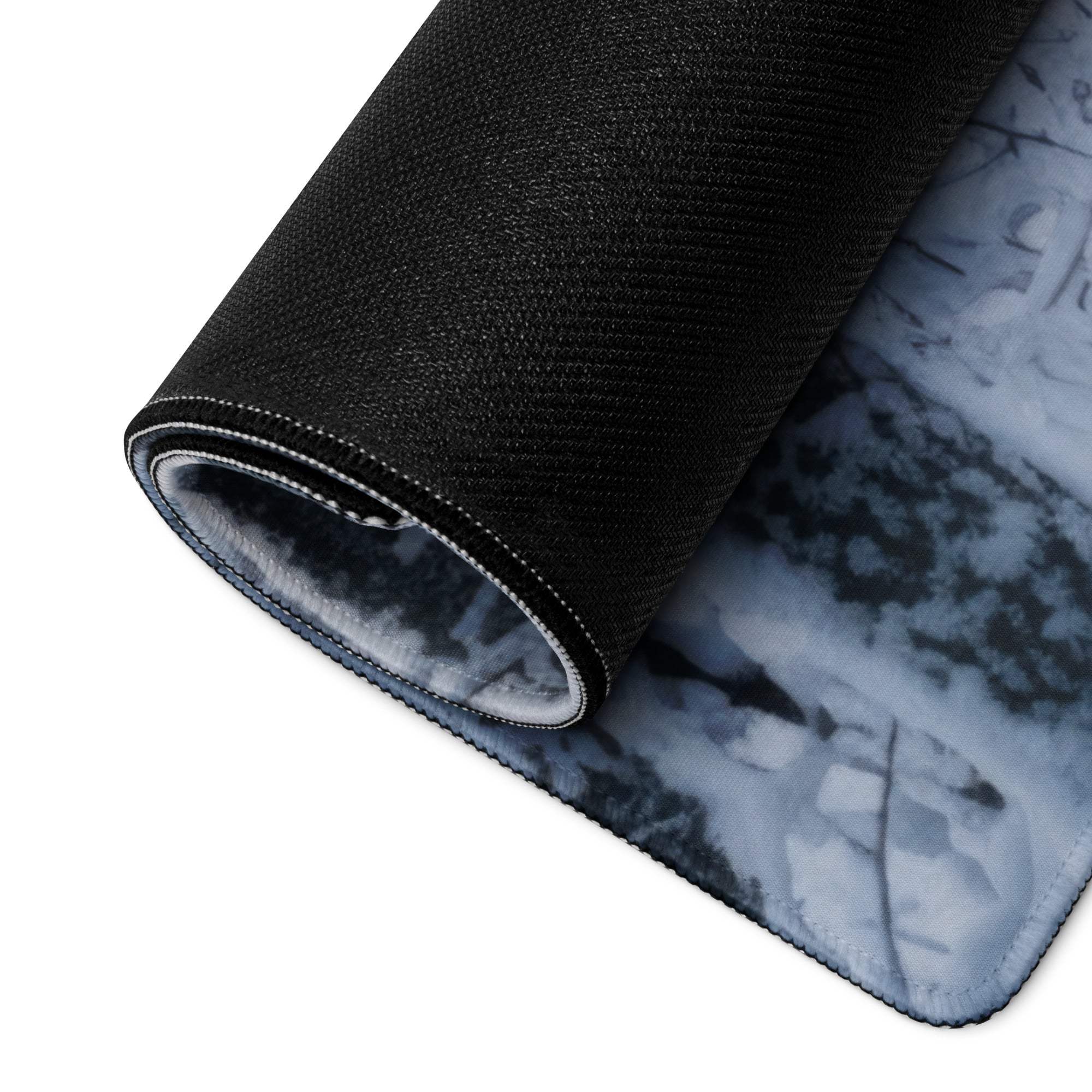 Winter Forest gaming mouse pad with snowy forest design and non-slip base