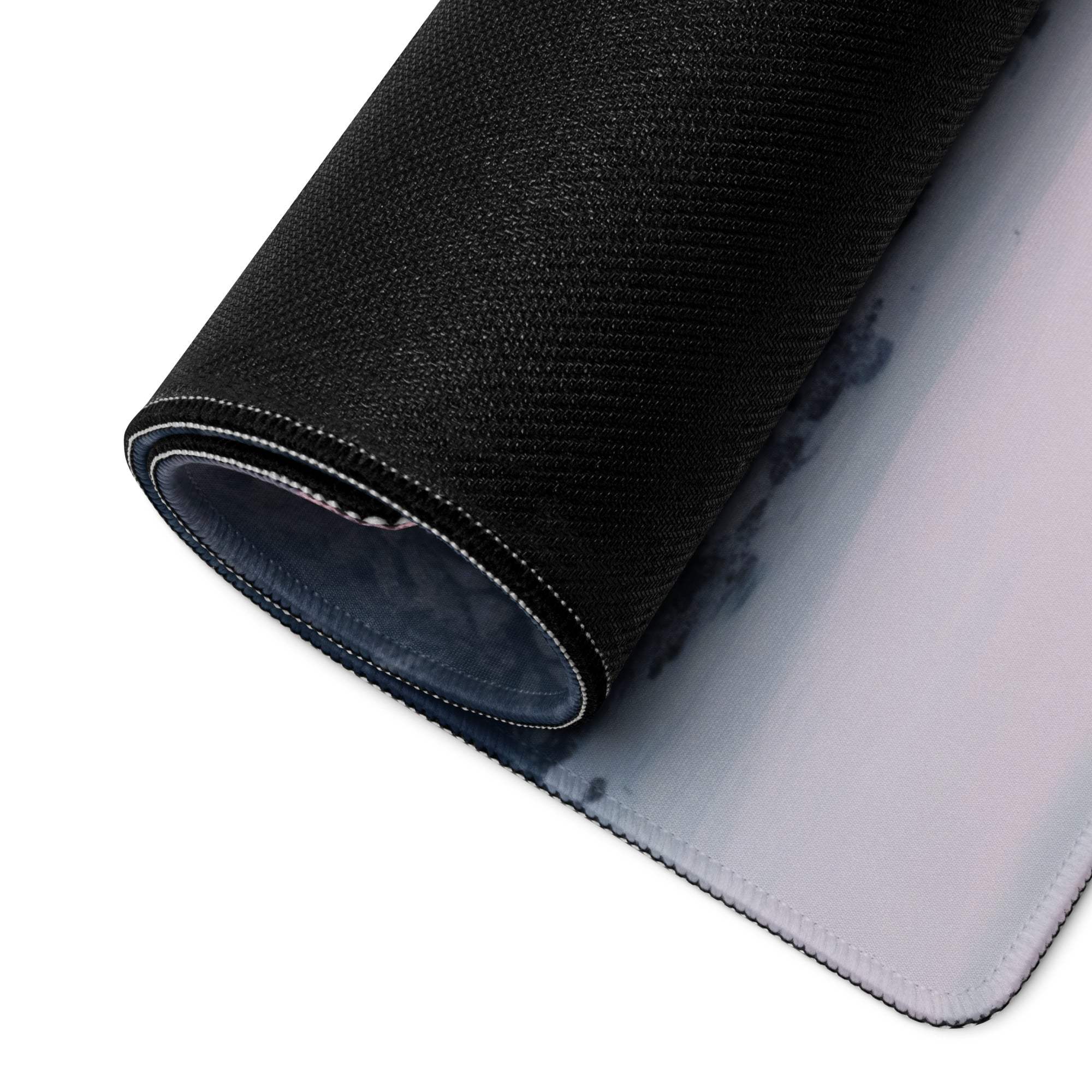 Back of Calm Winter Snow Forest large gaming mouse pad with black textured underside gradient and non-slip base