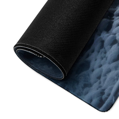 Black textured back of Wintry Blue Forest gaming mouse pad with non-slip base