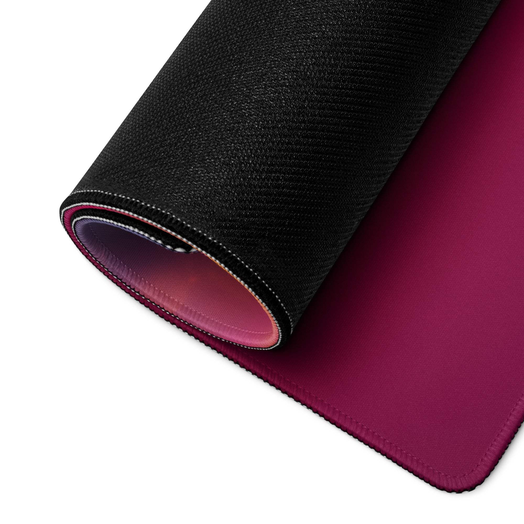 Black magenta gradient gaming mousepad with textured surface and smooth lining