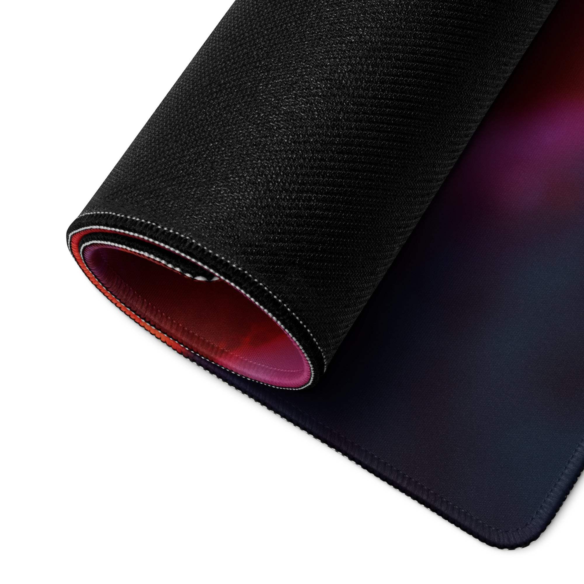Large non-slip gaming mouse pad with vibrant lava red purple gradient and red lining