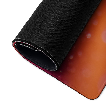Black textured gaming mousepad with orange-red gradient bokeh and stitched edges