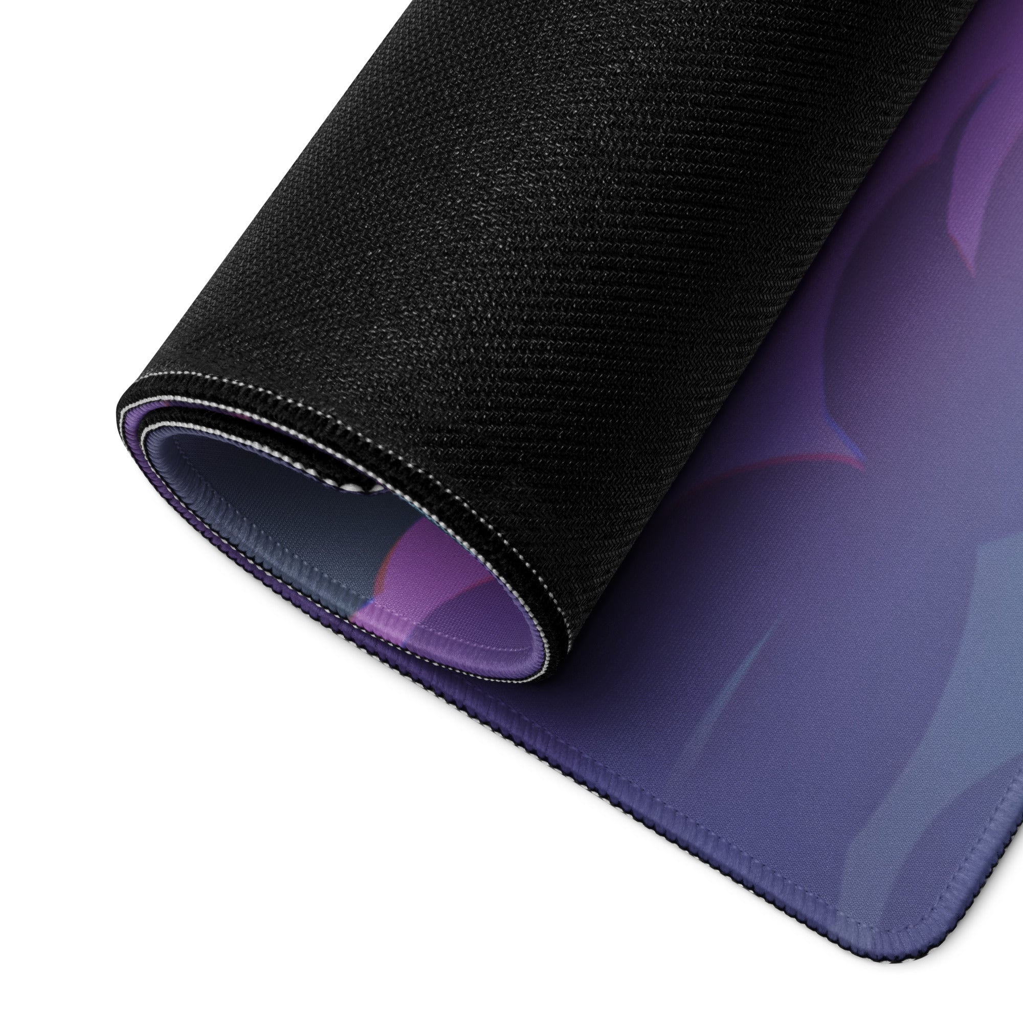 Rolled-up black gaming mousepad with vibrant purple pink blue vaporwave neon moon gradient design for desk use