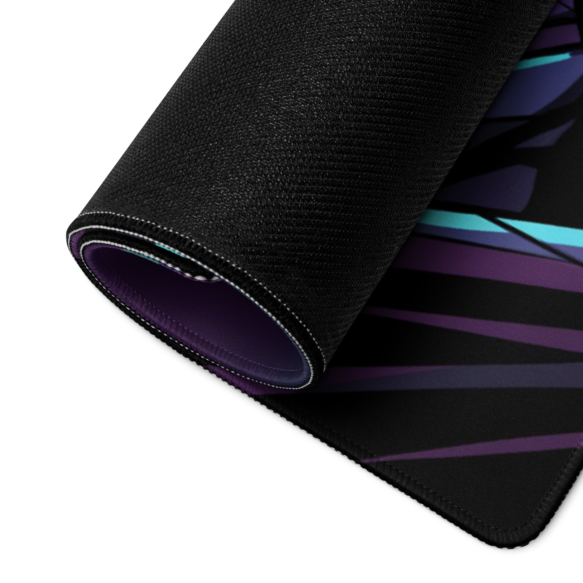 Black gaming mousepad with textured surface featuring vibrant purple and teal diagonal stripes for vaporwave gaming desk use