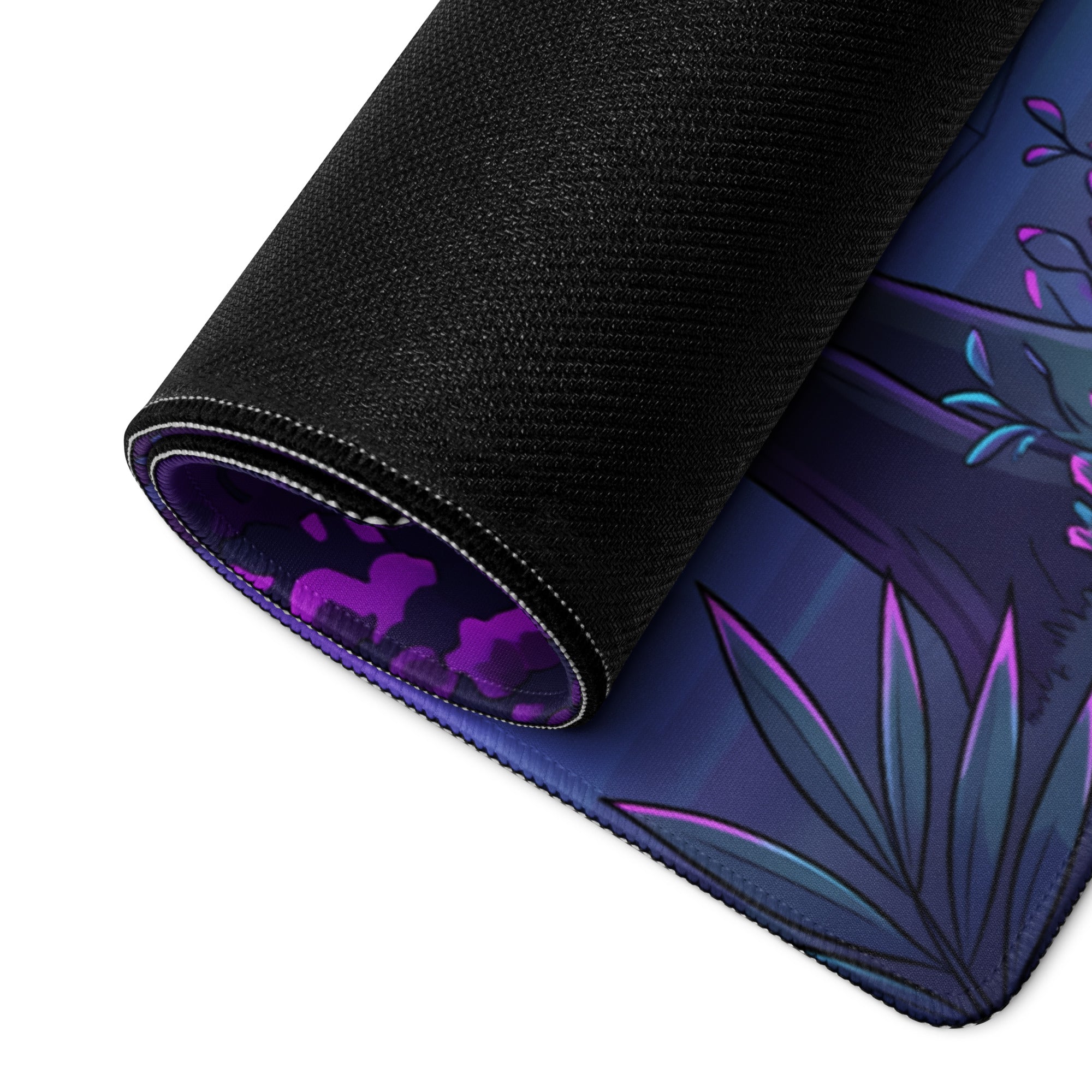 A rolled-up vaporwave neon garden gaming mouse pad with dark blue purple botanical design and black fabric edges