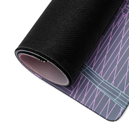 A rolled-up black gaming mousepad with a sleek geometric design in purple and teal vaporwave neon colors