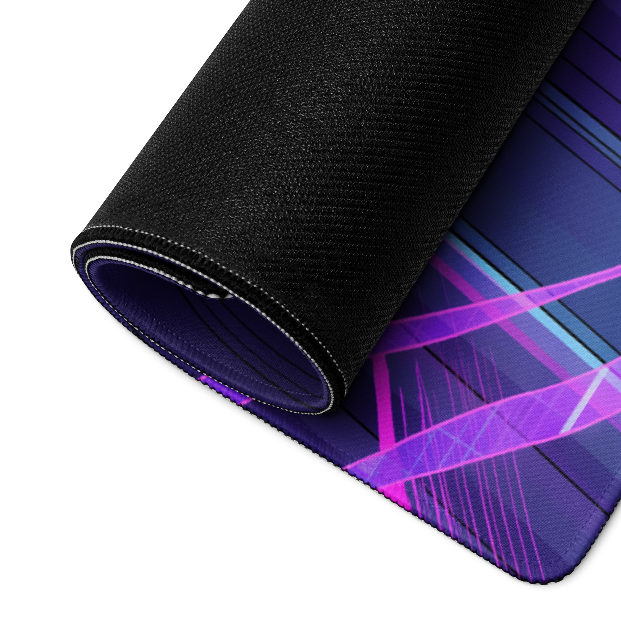 A rolled-up neon vaporwave office mouse pad with vibrant purple and blue neon geometric design and black fabric edges