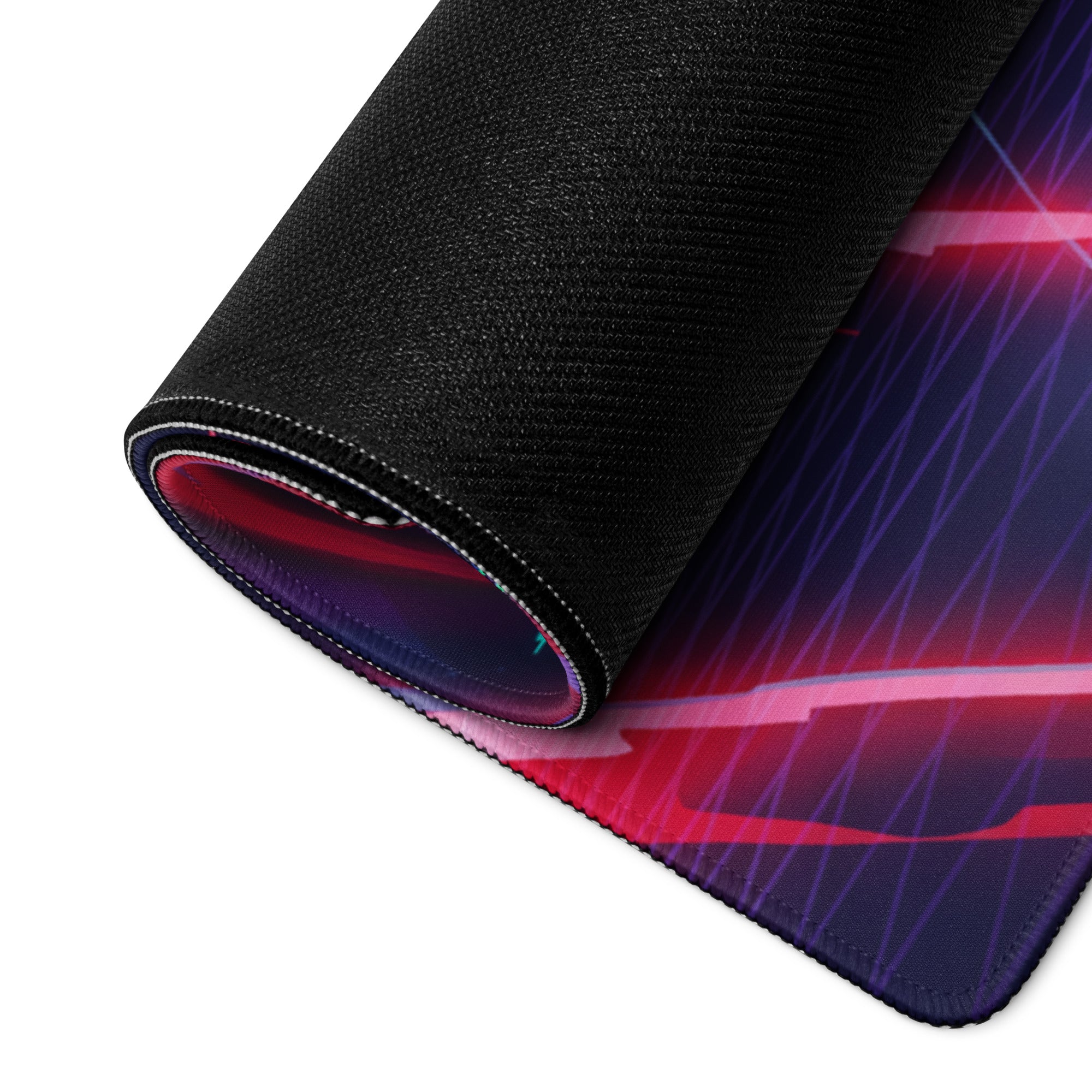 A rolled-up vaporwave power warrior gaming mousepad with neon pink purple blue abstract design and black textured border
