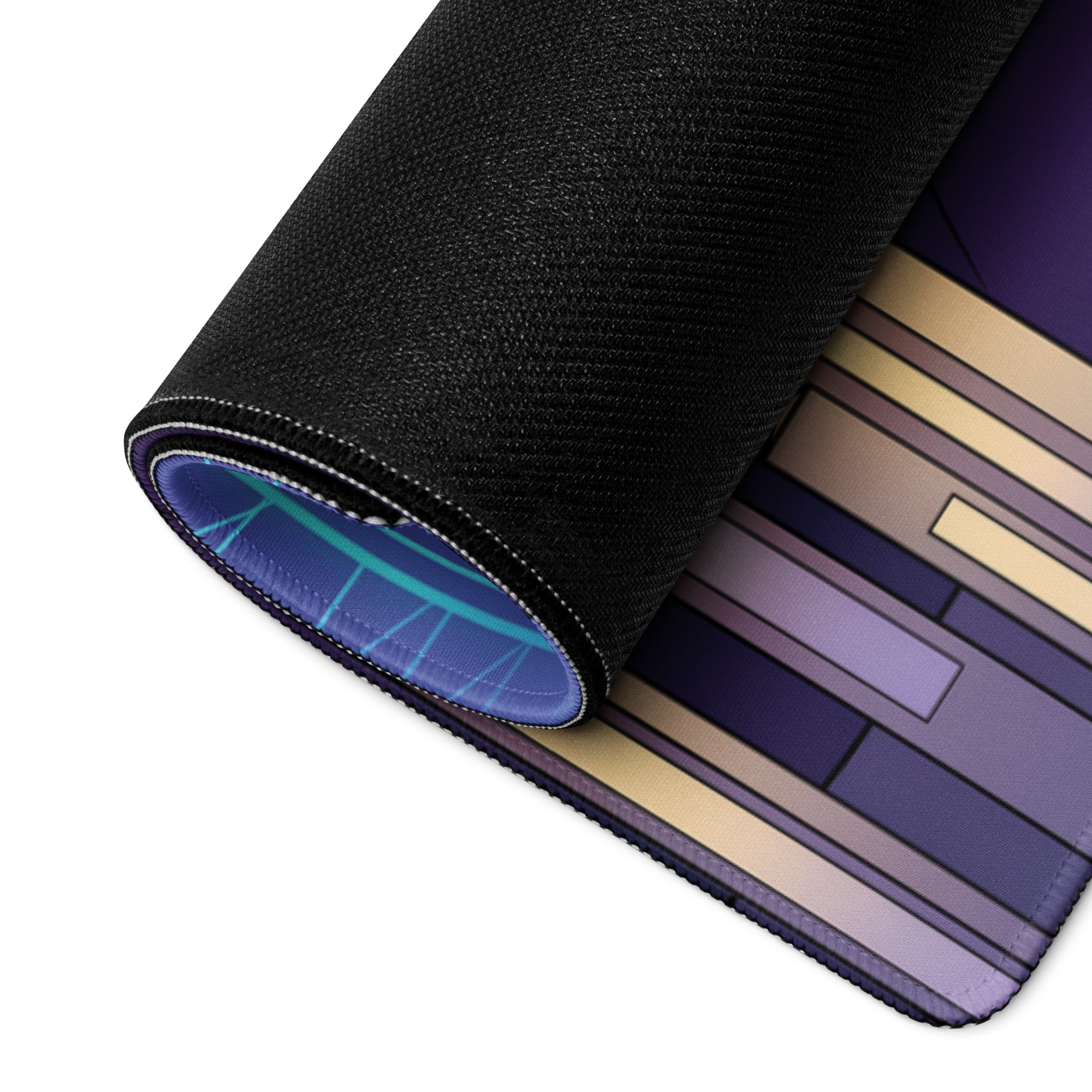 Rolled-up black neoprene gaming mouse pad with neon vaporwave geometric design in purple gold and blue shades